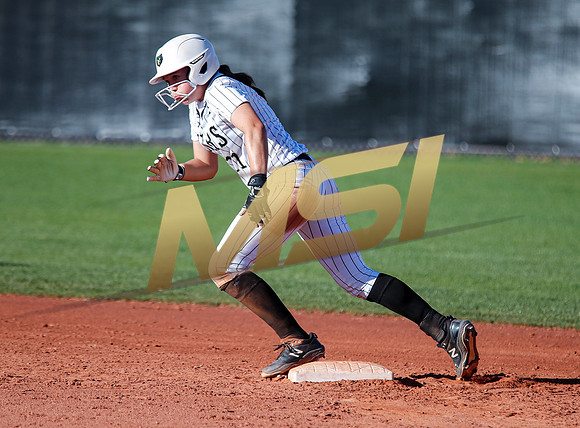 The  Red Mountain girls softball team take on the Basha Bears