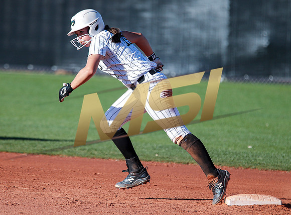 The  Red Mountain girls softball team take on the Basha Bears