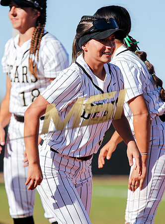 The  Red Mountain girls softball team take on the Basha Bears