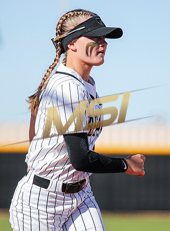 The  Red Mountain girls softball team take on the Basha Bears